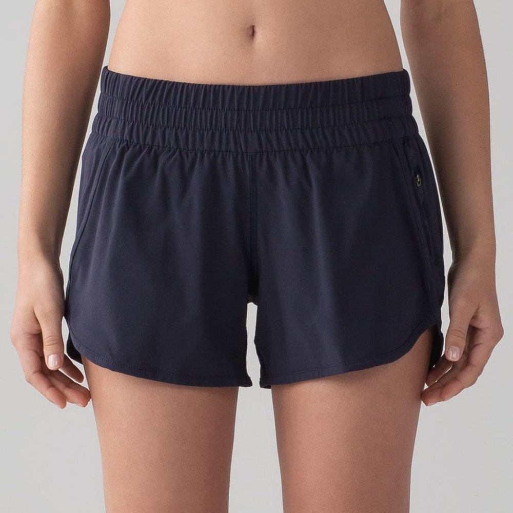 Lululemon Tracker Short v 4" in color Midnight blue Size 6